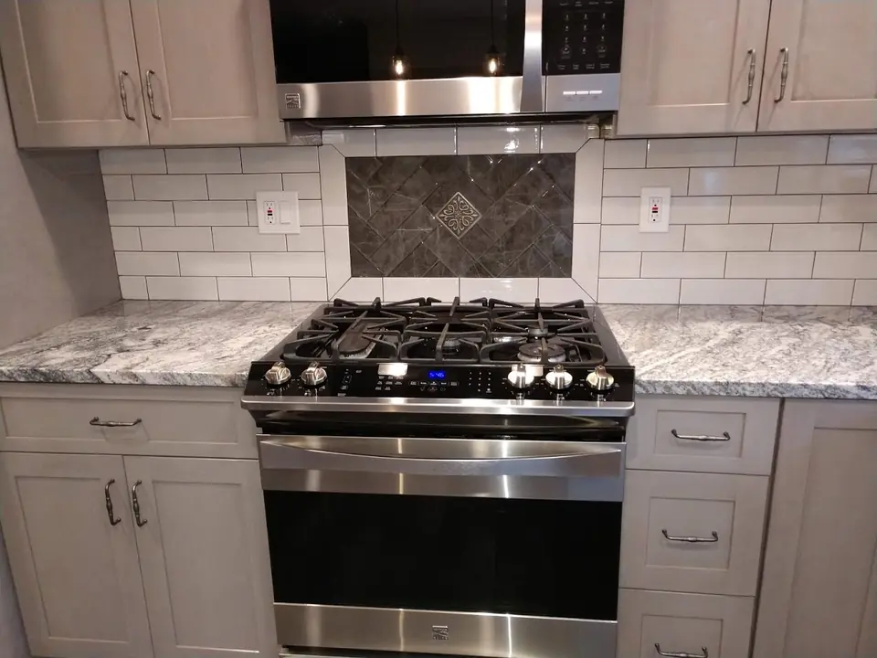 Range with a tile accent backsplash